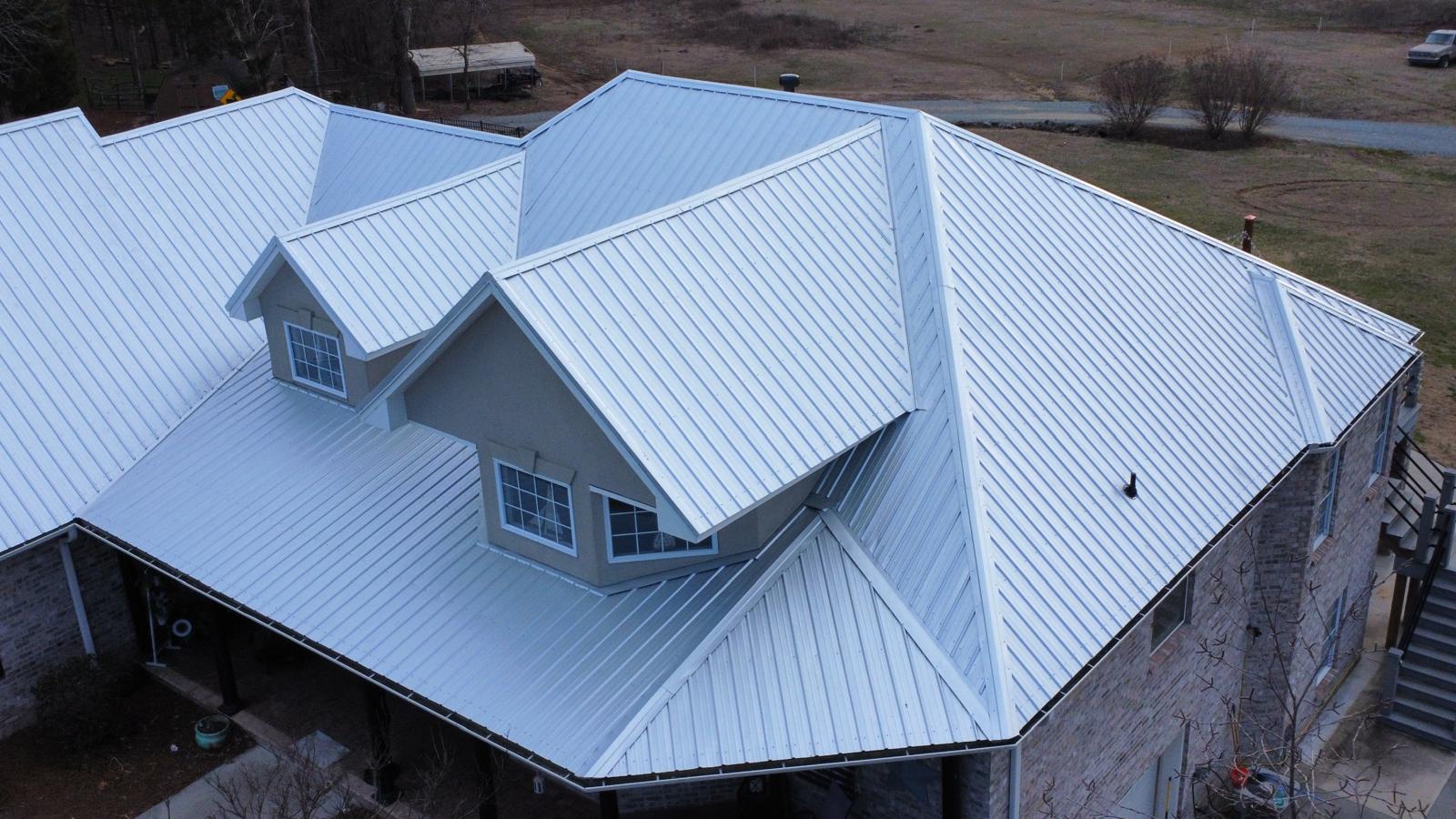 Standing seam metal roof installed on modern home in Asheboro North Carolina